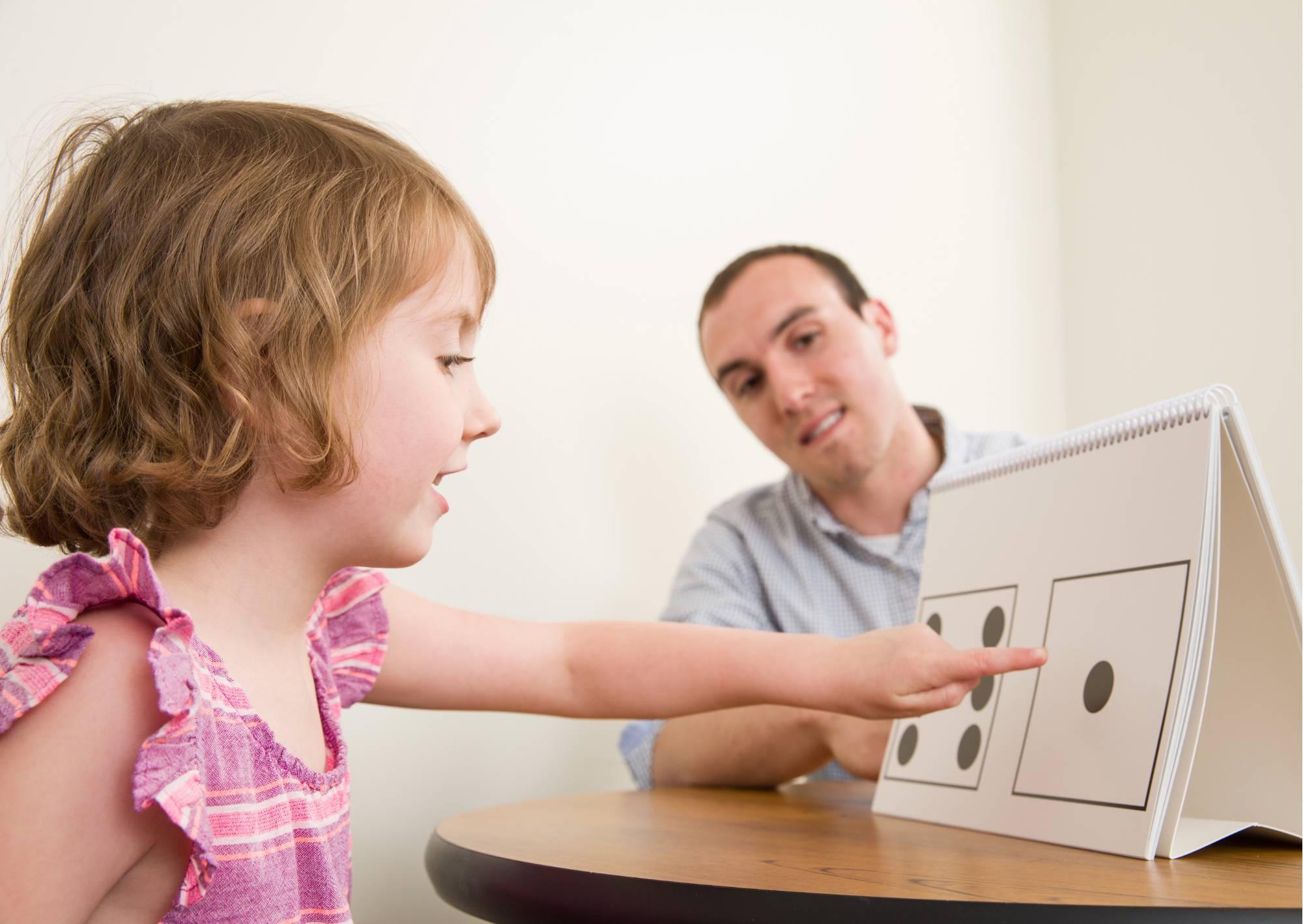 School psychologist testing child